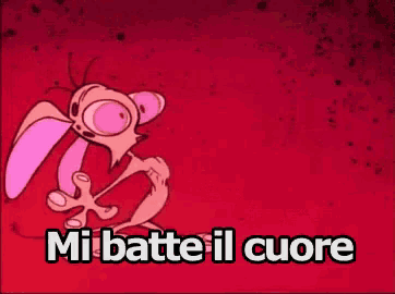 a cartoon character holding a pink heart with the words mi batte il cuore below him