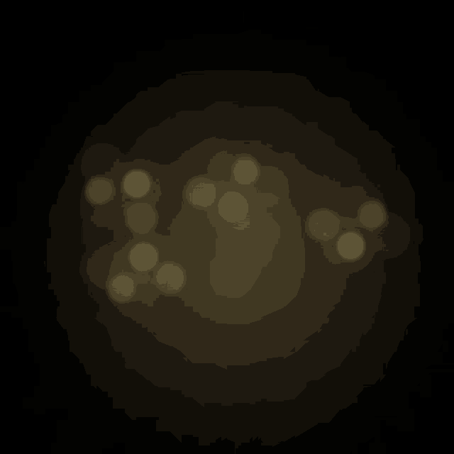 a blurred image of a dark background with circles