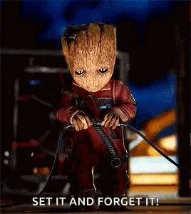 a baby groot from guardians of the galaxy is holding a sword and saying `` set it and forget it! ''