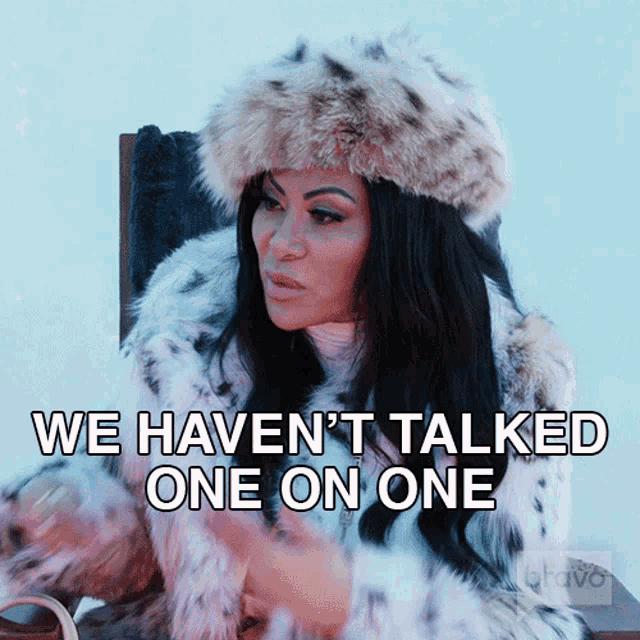 a woman in a fur coat says we haven t talked one on one