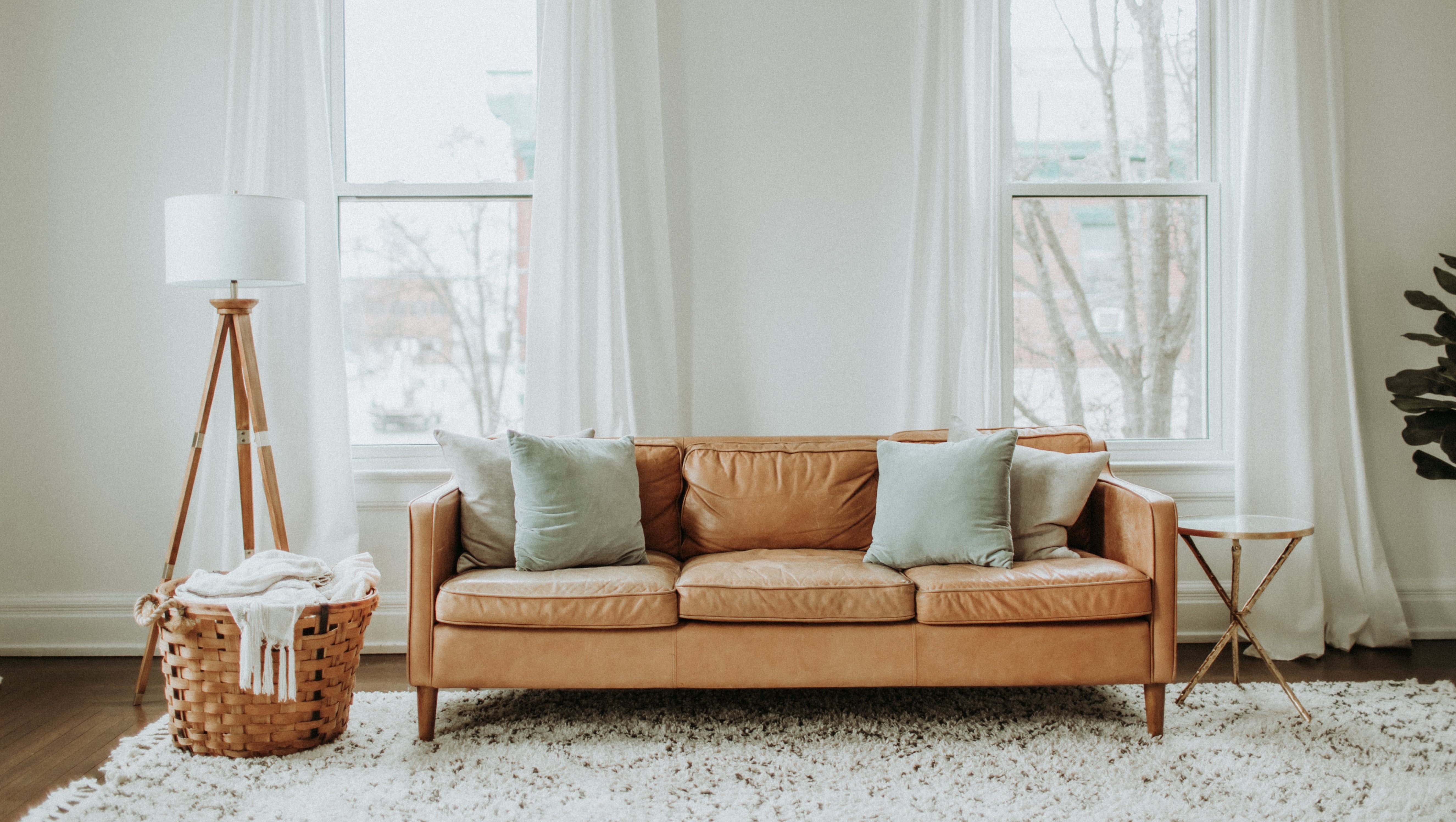 living room with couch and windows