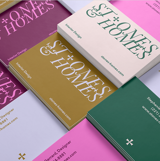 "Tarjetas de presentación bellamente diseñadas en diferentes colores para un negocio de diseño de interiores. "