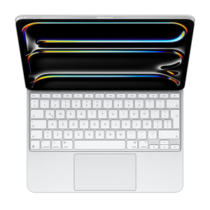 iPad Pro con Magic Keyboard blanco, que tiene teclas blancas y texto gris, teclas de dirección con flechas posicionadas en forma de T invertida, fila de teclas de función y trackpad integrado