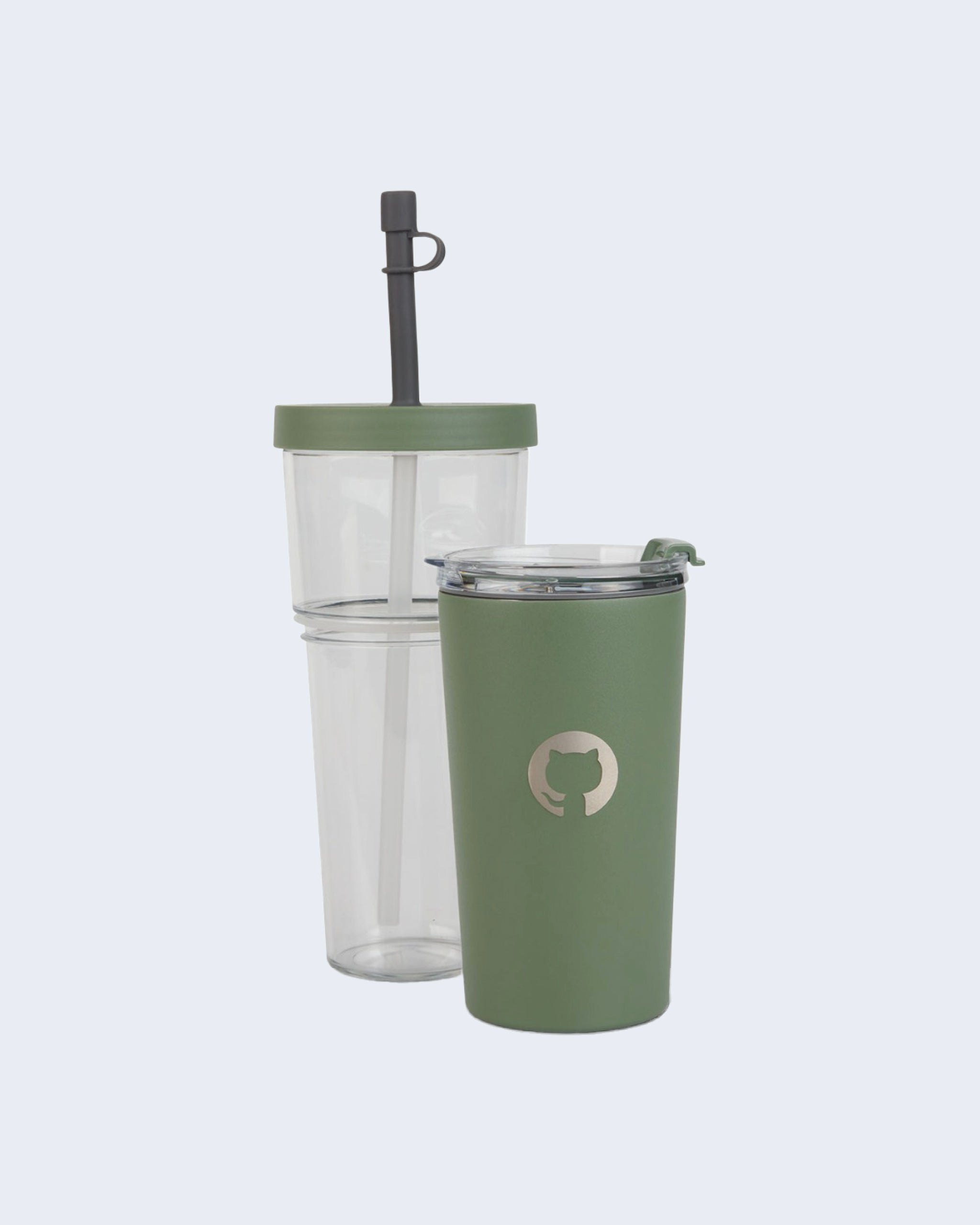 Set of GitHub tumblers, showing a clear Tritan cup with green lid and straw along with the green insulated stainless-steel mug with the Invertocat logo on the front and transparent lid on top.