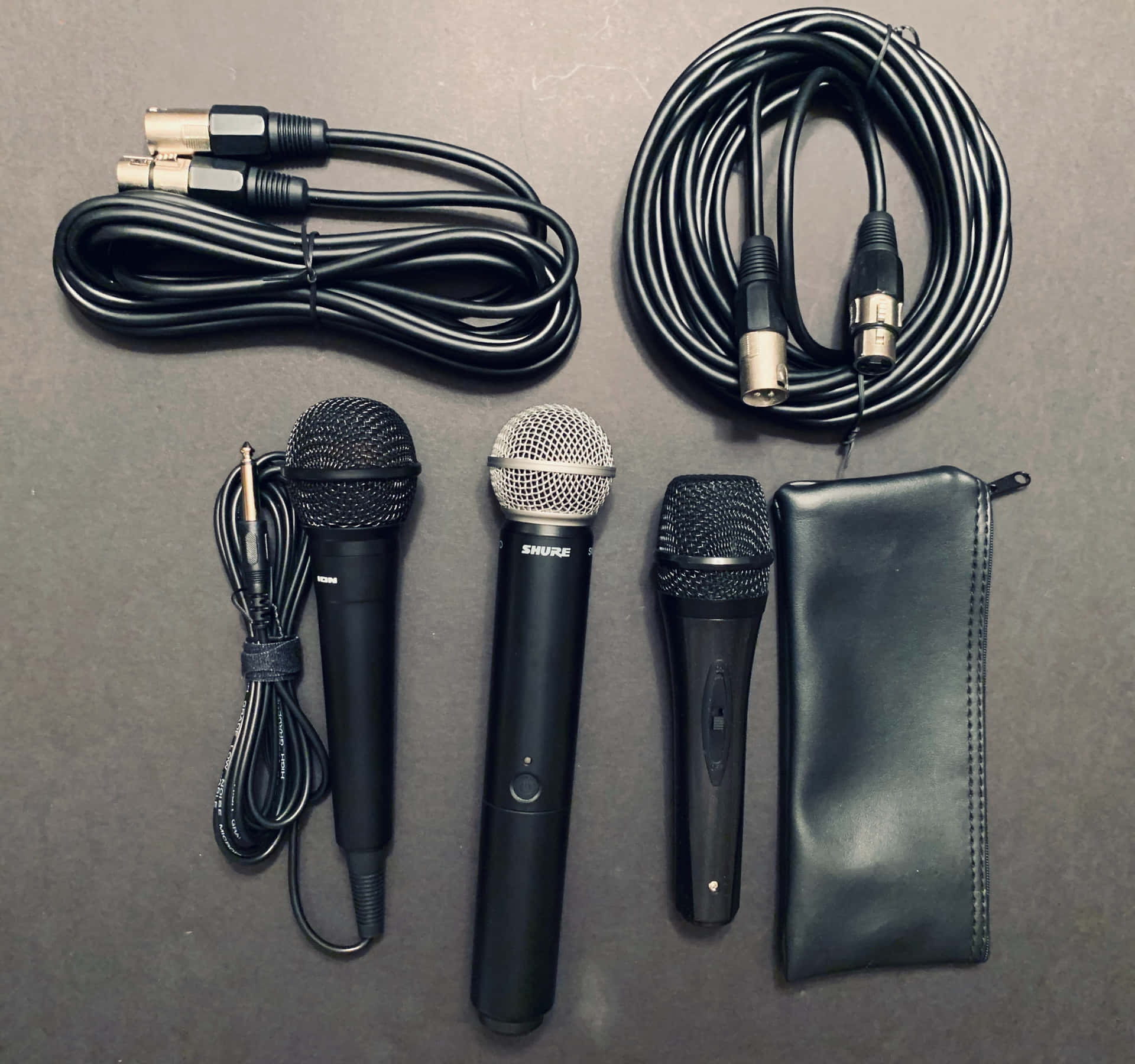 Tied Wires Pouch Microphones Background