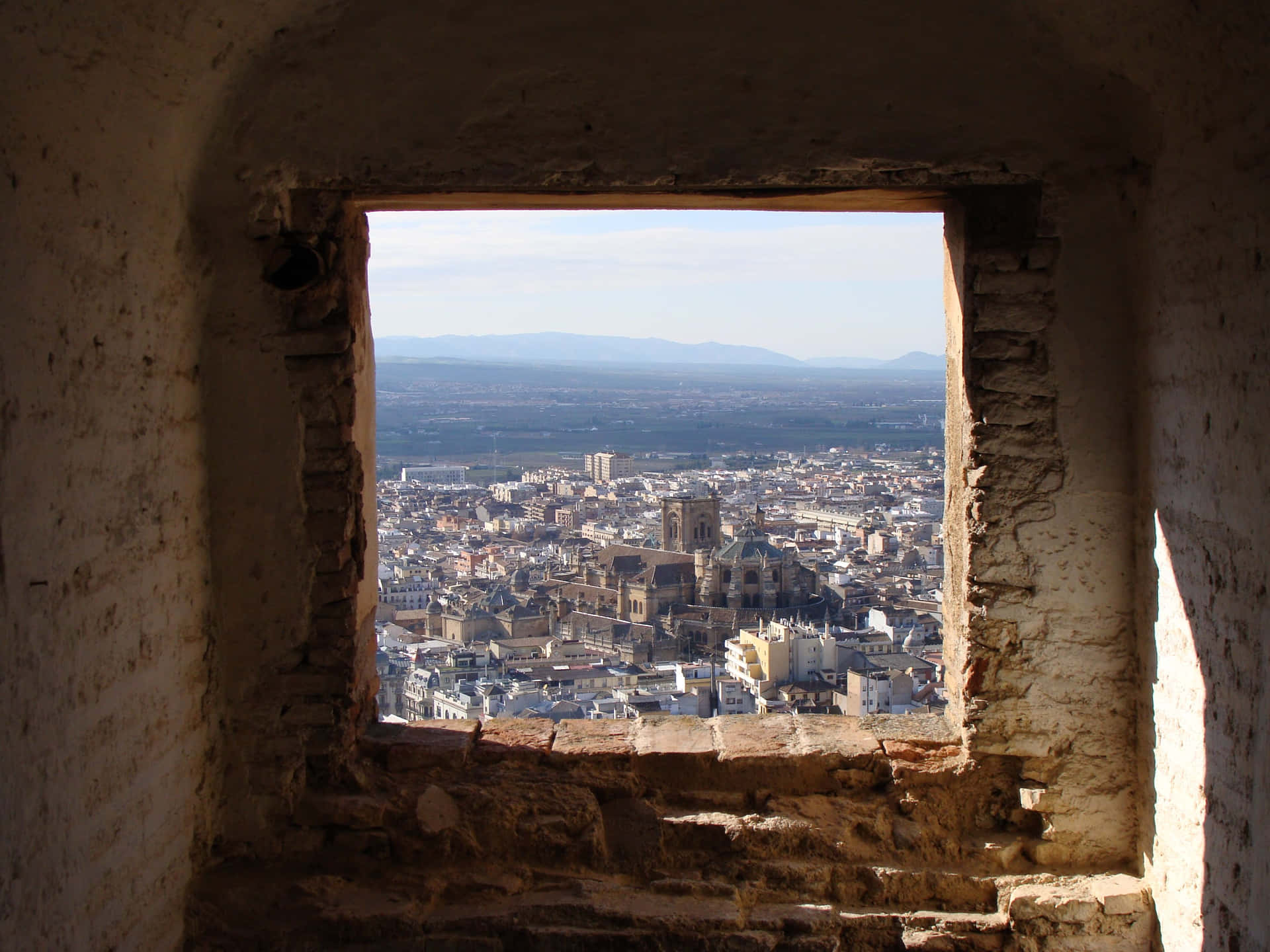 Vistade Un Horizonte De La Ciudad A Través De Una Ventana.