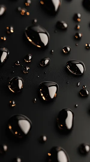 Black Water Droplets On A Smooth Dark Surface With Light Reflections Wallpaper