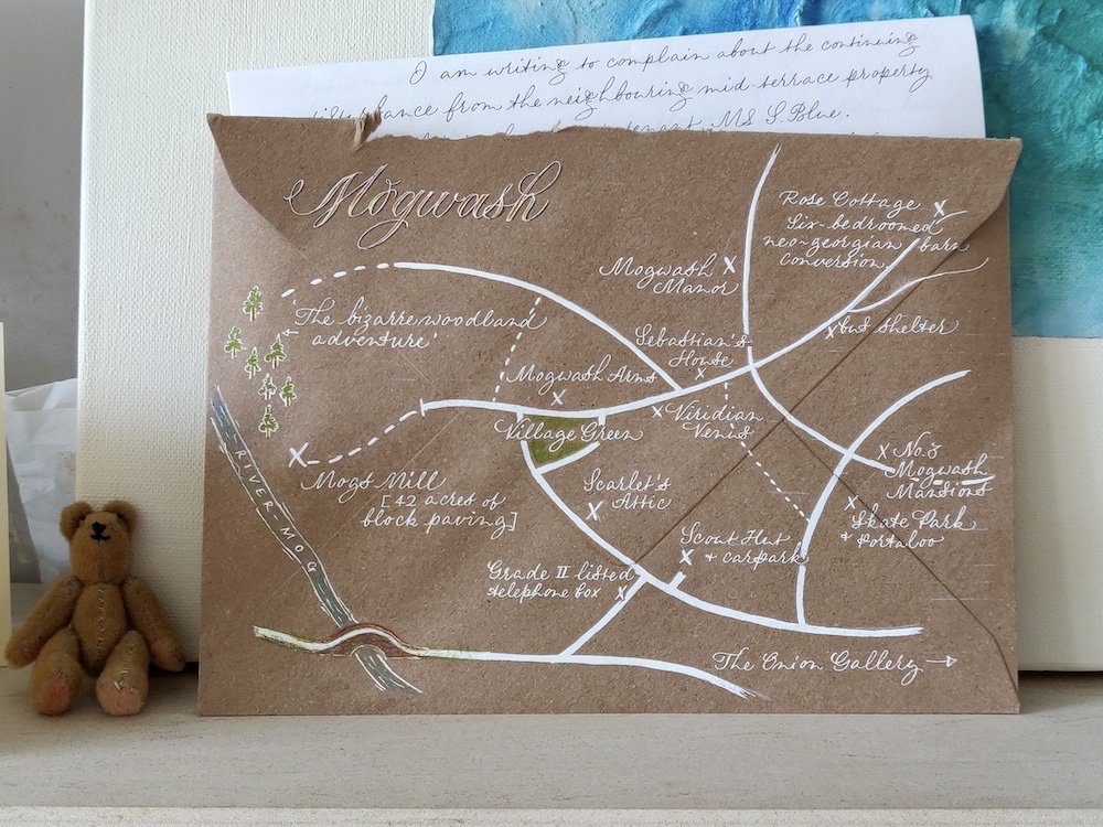 map-on-the-back-of-envelope-on-mantelpiece