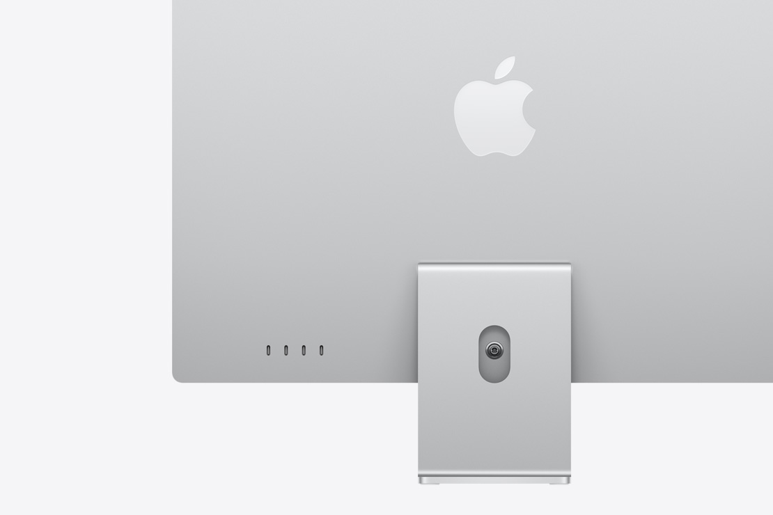 iMac сріблястого кольору: вид ззаду, із акцентом на 4 порти USB‑C