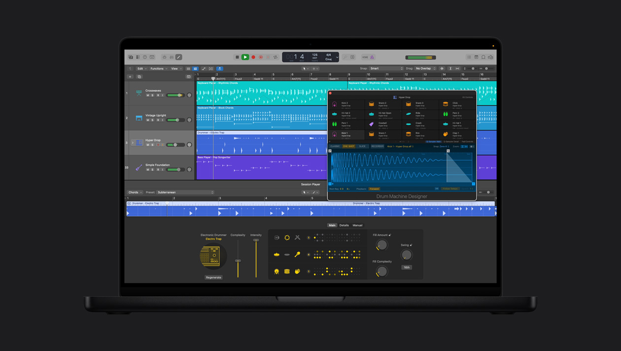 Pantalla de un MacBook Pro de 16 pulgadas que muestra Electronic Drummer, ventana Hyper Drop abierta con Drum Kit Designer, a la izquierda hay filas para Crosswaves, Vintage Upright, Hyper Drop y Simple Foundation, en la parte inferior están los controles de Electronic Drummer Electro Trap