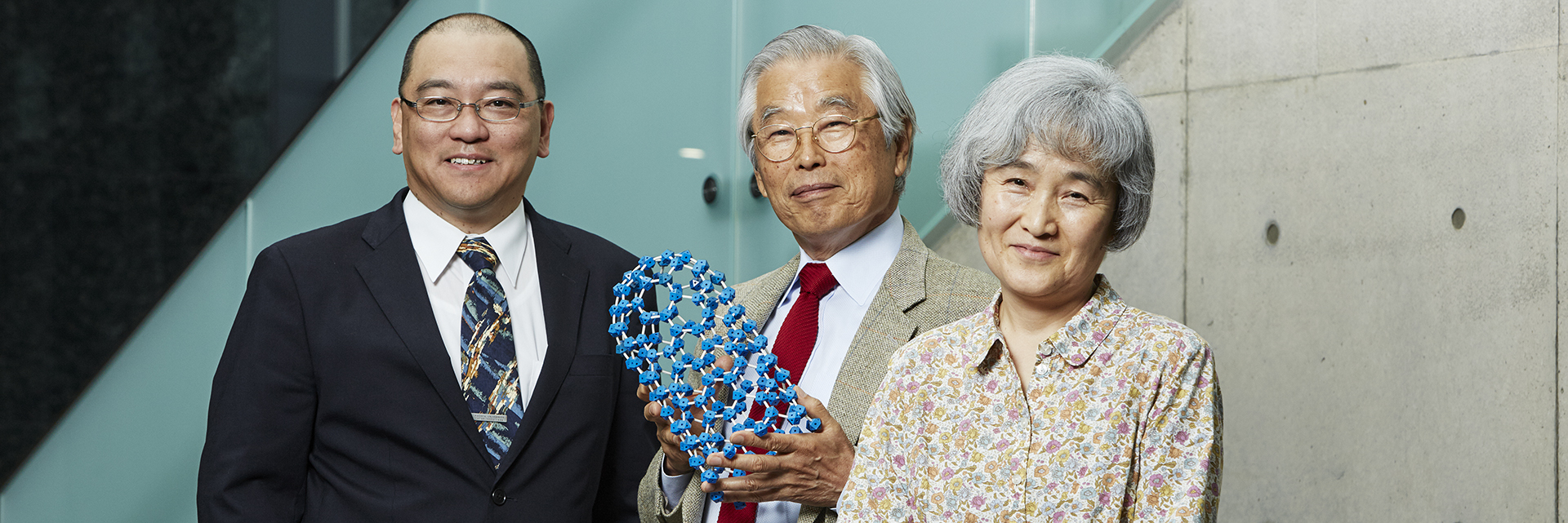 Sumio Iijima and team