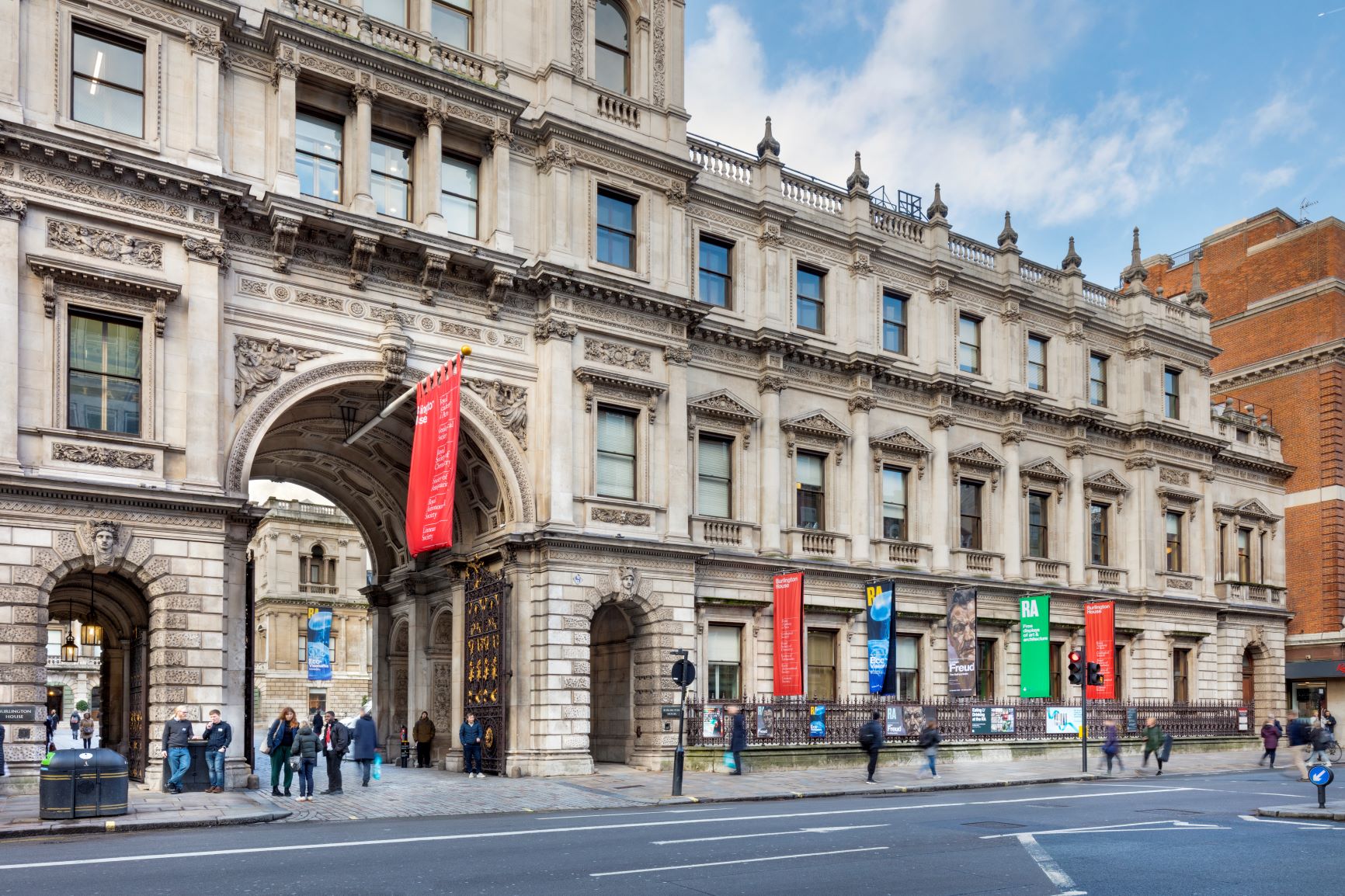 Large period building with arched entrance which is home to the Geological Society