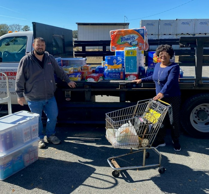 Our family members donating goods to those in need.