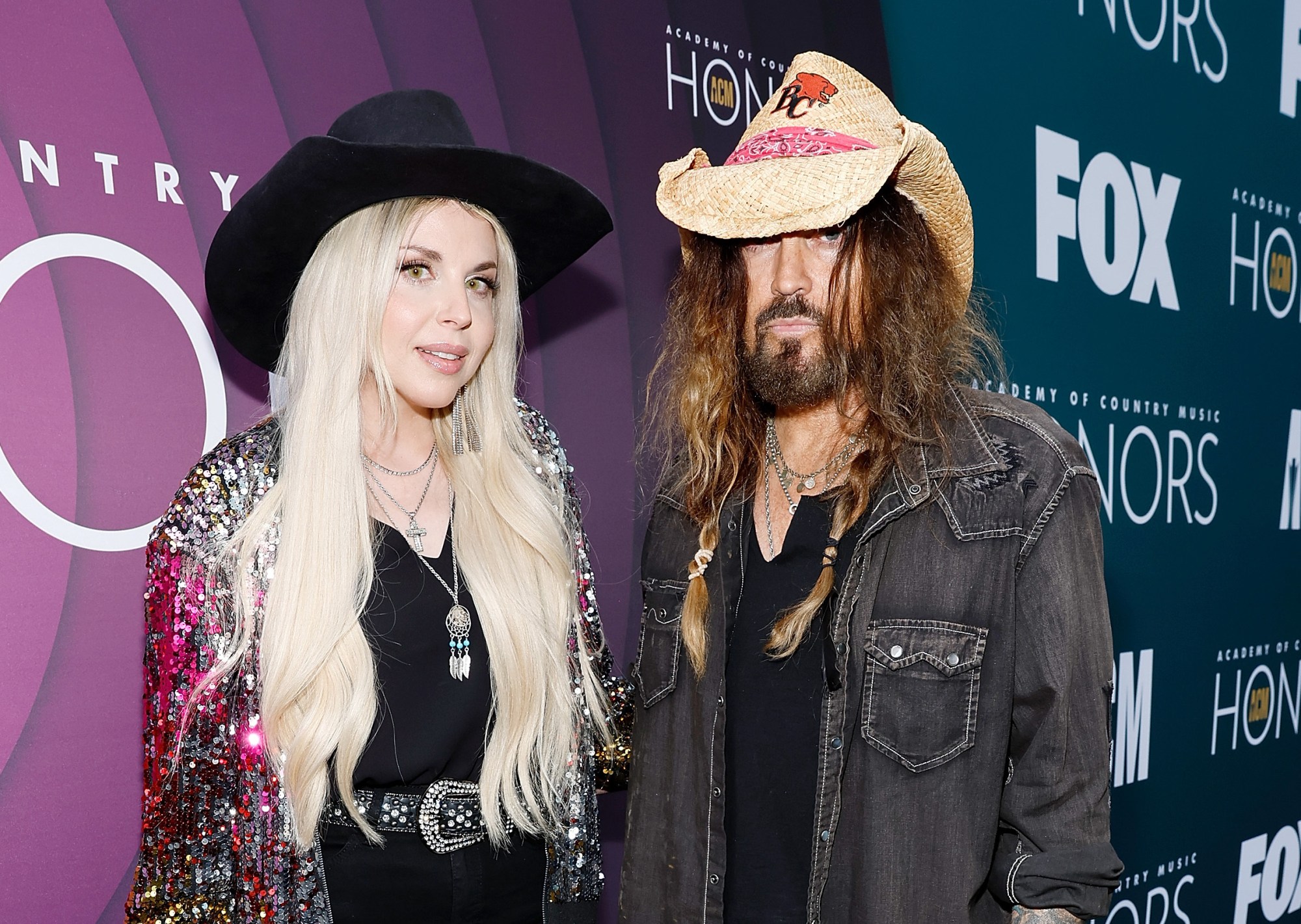 NASHVILLE, TENNESSEE - AUGUST 23: (L-R) FIREROSE and Billy Ray Cyrus attend the 16th Annual Academy of Country Music Honors at Ryman Auditorium on August 23, 2023 in Nashville, Tennessee. (Photo by Jason Kempin/Getty Images for ACM)