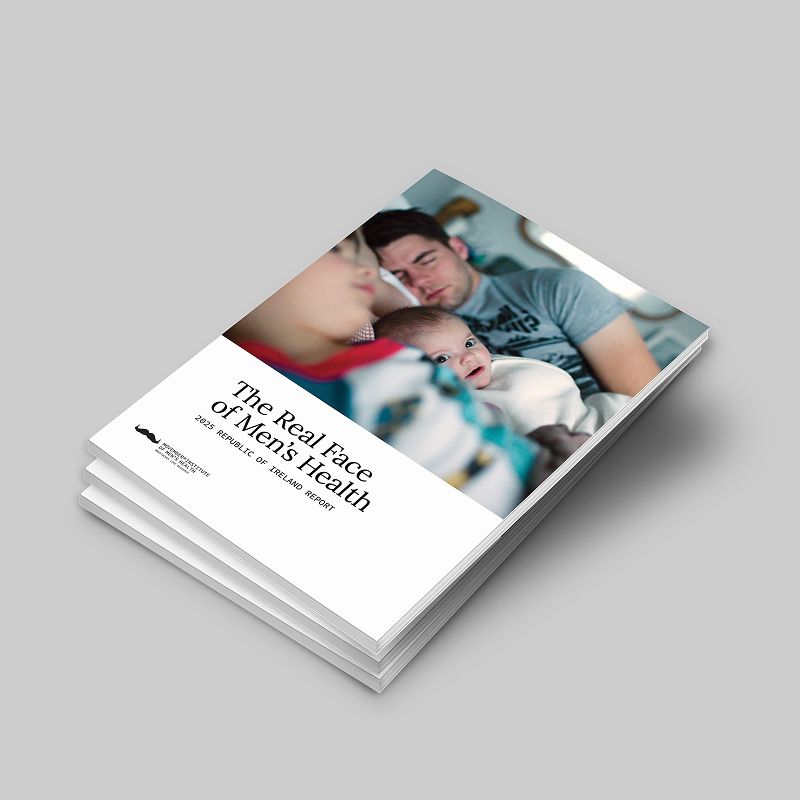 A stack of reports with the title "The Real Face of Men's Health"