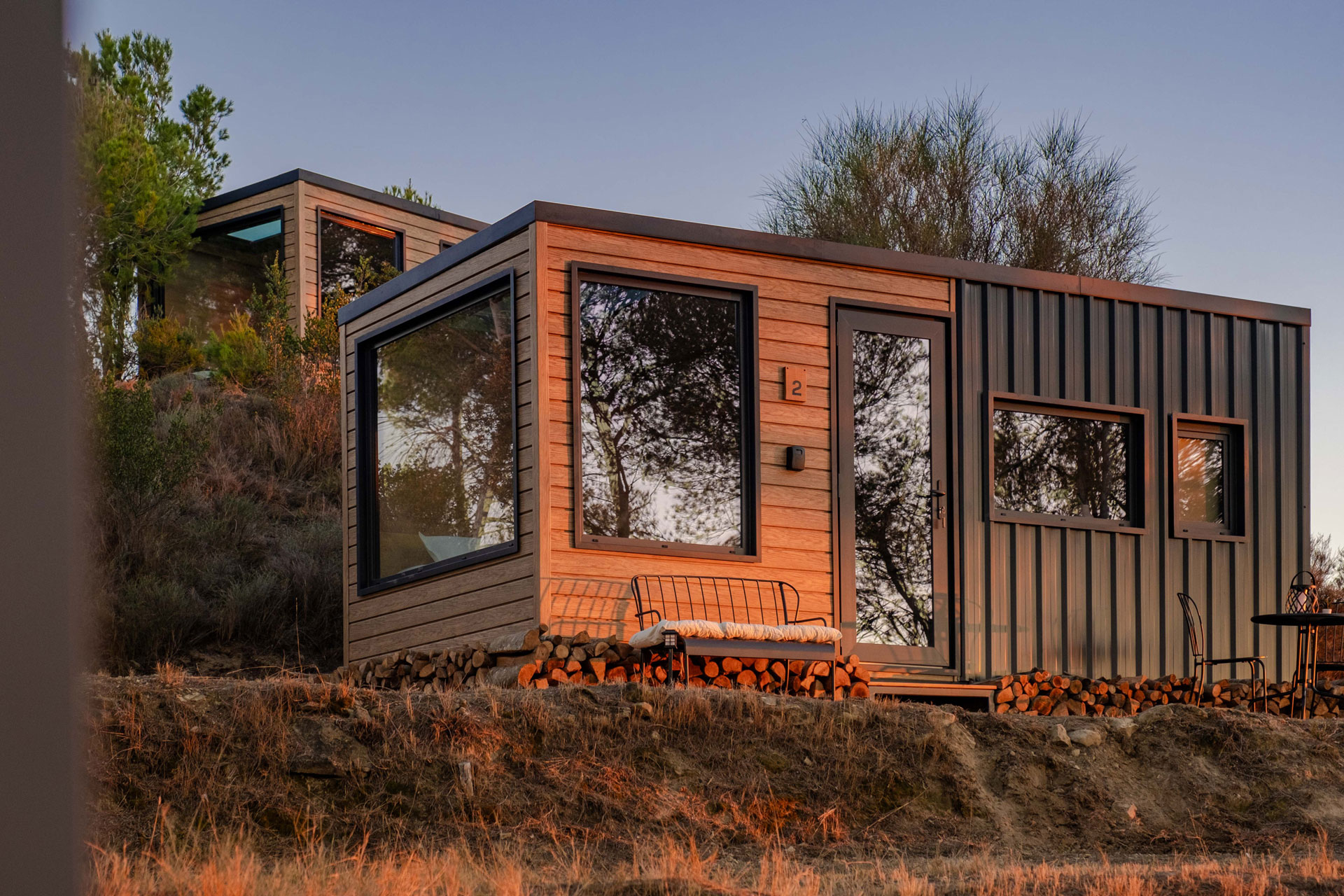 Cabaña Nomading Camp ventanales bosque