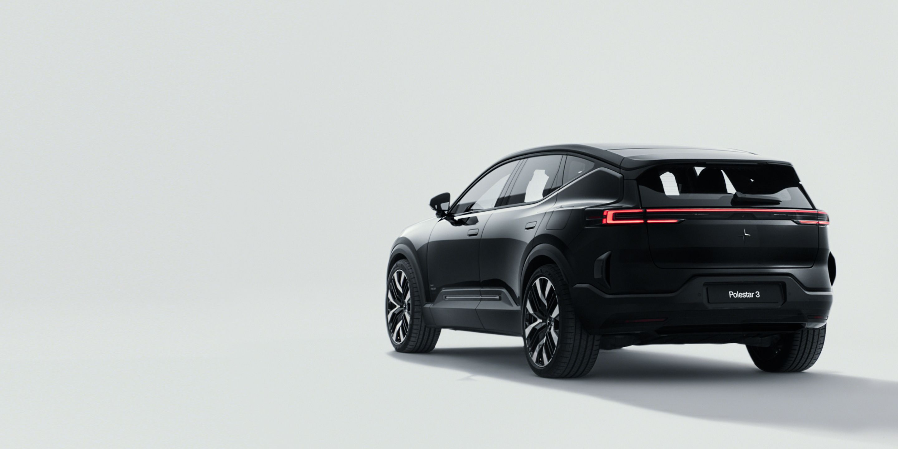 A black Polestar 3 shown against a completely white background.